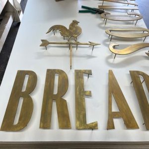 Brass laser cut signage letters